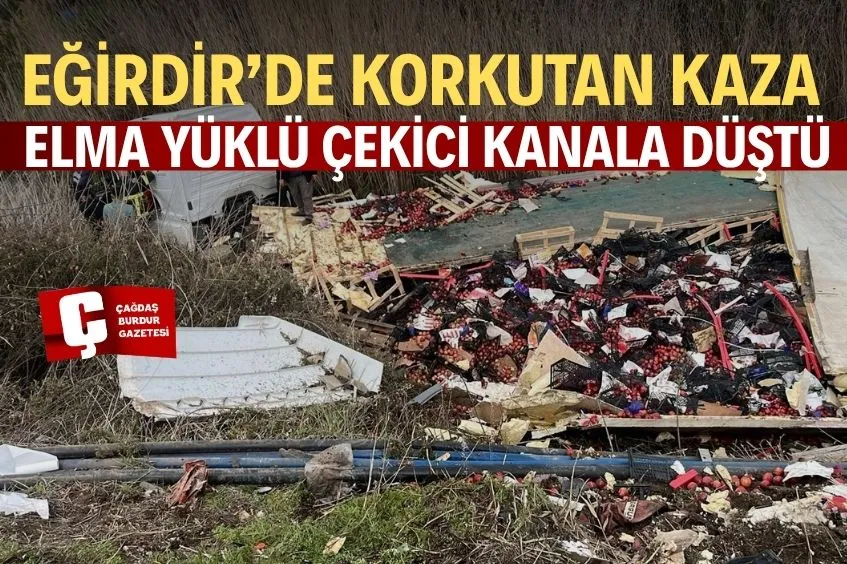 ISPARTA'DA ELMA YÜKLÜ ÇEKİCİ KANALA DEVRİLDİ: 1 YARALI